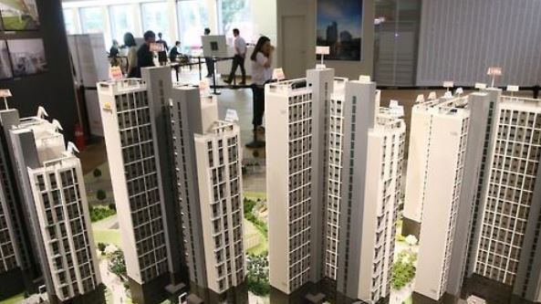 This undated file photo shows a model of apartment buildings to be built and up for sale. (Yonhap)