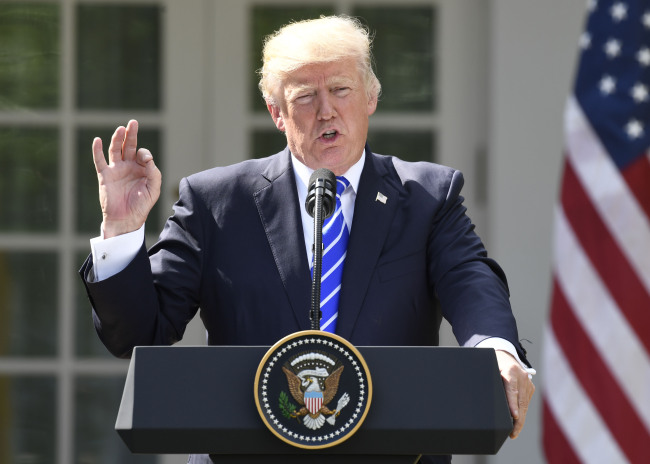 US President Donald Trump speaks to the media at the White House on Tuesday. Yonhap