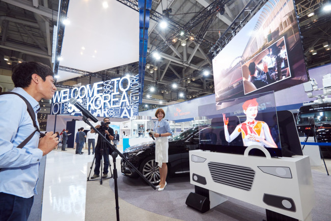 Visitors look around SK Telecom’s booth at the ITU World 2017 event in Busan, Thursday (ITU)