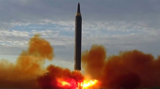 A North Korean intermediate range ballistic missile is seen taking off in a photograph released by Pyongyang's state-run media on Sept. 16. Yonhap