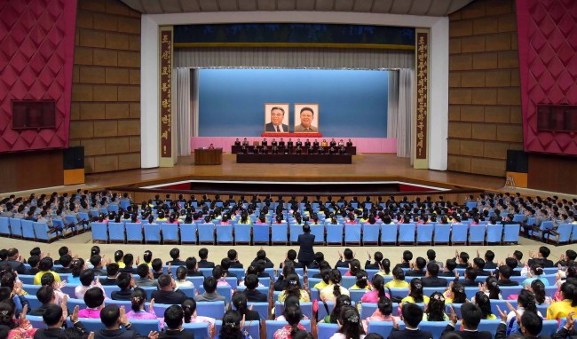 North Koreans participate in a ceremony marking the 20th anniversary of Kim Jong-il being named chief of the country's ruling party on Setp. 6. Yonhap