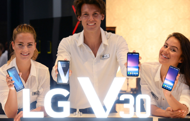 Models introduce LG's latest V30 smartphones at IFA Berlin in September. (LG Electronics)