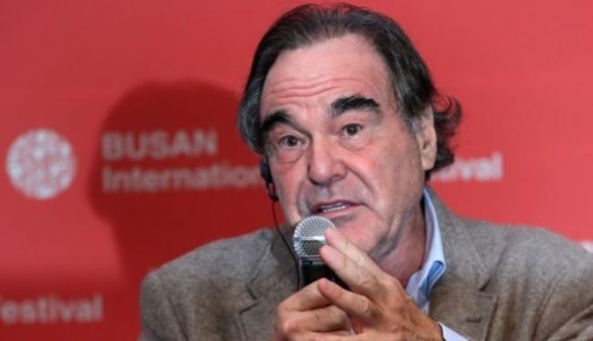 American director Oliver Stone answers questions from reporters during a news conference at the 22nd Busan International Film Festival in Busan on Oct. 13, 2017. (Yonhap)