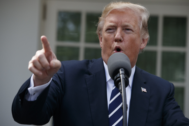 US President Donald Trump speaks during a press conference at the White House on Monday. Yonhap