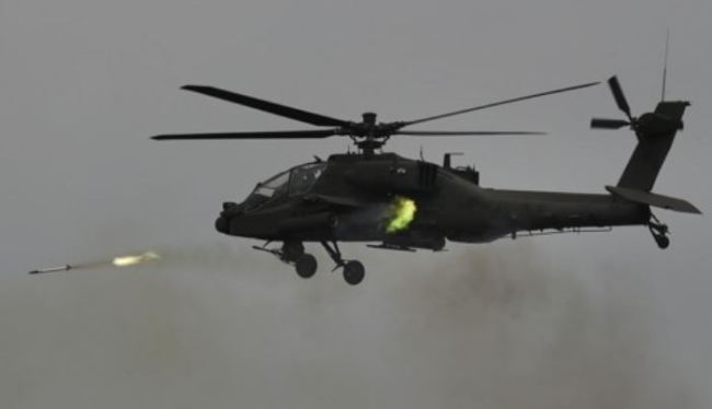 An Apache attack helicopter conducts a firing drill in this file photo. (Yonhap)