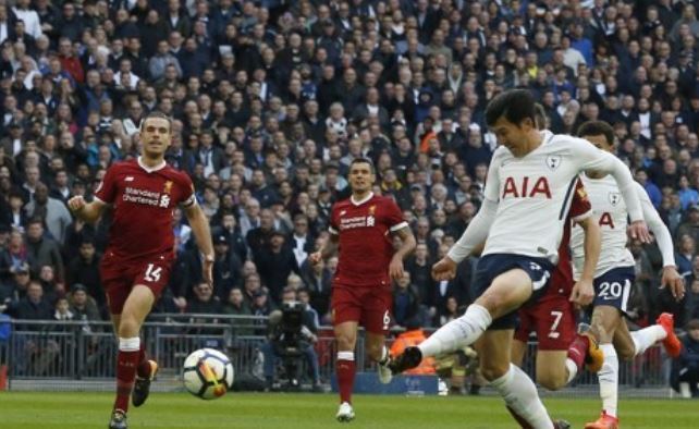 In this photo taken by the Associated Press, Tottenham Hotspur's South Korean forward Son Heung-min (R) scores his club's second goal against Liverpool during their English Premier League match at Wembley Stadium in London on Oct. 22, 2017. (Yonhap)