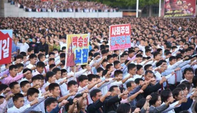 This photo carried by North Korea's Rodong Sinmun newspaper on Sept. 24, 2017, shows North Koreans holding a rally against the United States. (For Use Only in the Republic of Korea. No Redistribution) (Yonhap)