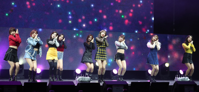 Twice performs during a media showcase for its first full-length album “Twicetagram,” in Seoul on Monday. (Yonhap)