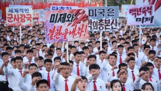 This file photo released by the Korean Central News Agency on Sept. 24, 2017, shows North Koreans holding a mass anti-U.S. rally in Pyongyang on Sept. 23, 2017. (Yonhap)