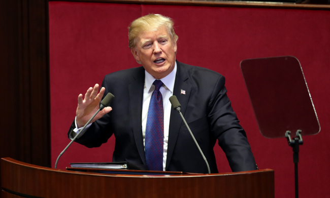 US President Donald Trump speaks at the National Assembly in Seoul, South Korea. (Yonhap)
