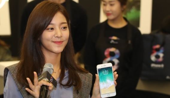 A model poses with Apple Inc.`s iPhone 8 during a release ceremony hosted by South Korea`s No. 1 mobile carrier, SK Telecom Co., in this photo released by the company Nov. 3, 2017. (Yonhap)