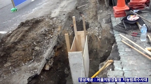 [사진=입찰 담합 업체가 시공한 서울의 한 도로포장 공사 현장]