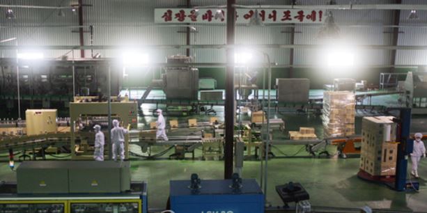 This file photo taken July 18, 2007 shows the production of bottled water at a factory near Mount Kumgang in North Korea. (Yonhap)
