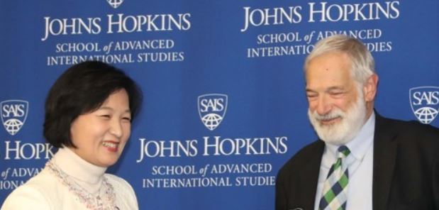 Robert Gallucci, head of the U.S.-Korea Institute at the Johns Hopkins School of Advanced International Studies, smiles with Choo Mi-ae, leader of South Korea's ruling Democratic Party, at a forum held at the think tank in Washington on Nov. 15, 2017. (Yonhap)