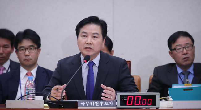 Minister of SMEs and Startups Hong Jong-haak testifies before the lawmakers. Yonhap
