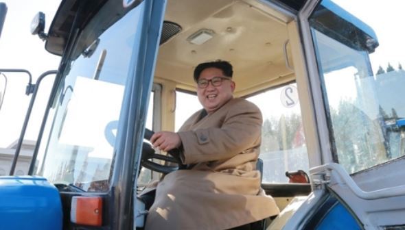 North Korean leader Kim Jong-un smiles inside a tractor during his visit to the Kumsong Tractor Factory in Gangso, South Pyongan Province, in a photo released by the North's official news agency KCNA on Nov. 15, 2017. (For Use Only in the Republic of Korea. No Redistribution) (Yonhap)