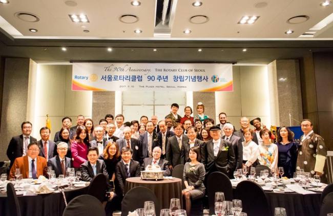 Rotarians pose for a photo at Seoul Rotary Club’s 90th anniverary event. Seoul Rotary Club.