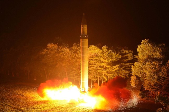 North Korea test-fires a Hwasong-14 intercontinental ballistic missile in July. (Yonhap)