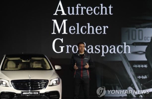 In this photo taken Nov. 30, 2017, Mercedes-Benz Korea President and CEO Dimitris Psillakis highlights the carmaker`s high-performance AMG vehicles in a press event held in Yeongdeungpo, southwestern Seoul, to celebrate the 50th anniversary of AMG models. (Yonhap)