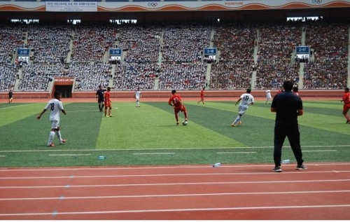 This photo provided by the Gangwon Provincial Government shows a youth football match at the Rungrado 1st of May Stadium in Pyongyang on Aug. 22, 2015. (Yonhap)