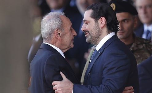 In this Nov. 22, 2017 file photo, Lebanese Parliament Speaker Nabih Berri, left, greets Lebanese Prime Minister Saad Hariri at a military parade to mark the 74th anniversary of Lebanon's independence from France in downtown Beirut, Lebanon. (AP-Yonhap)