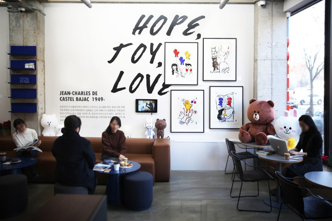 LINE FRIENDS X CASTELBAJAC -- Limited-edition works of art created by Jean-Charles de Castelbajac in collaboration with Line Friends are on display at the Art Major Cafe in Gangnam, Seoul, Wednesday. The four types of collaborative art pieces, designed by Castelbajac, feature Line Friends characters Brown, Cony and Sally. A total 400 pieces are available for sale. (Line Friends)