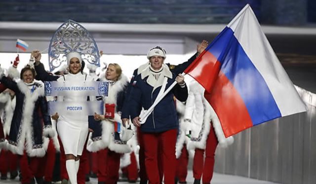 In this Associated Press photo taken Feb. 7, 2014, members of the Russian delegation enter Fisht Olympic Stadium for the opening ceremony of the 2014 Sochi Winter Olympics. The International Olympic Committee banned Russia from the 2018 PyeongChang Winter Olympics over state-sponsored doping on Dec. 5, 2017, allowing only a select few athletes to compete as neutrals if they meet strict conditions. (Yonhap)