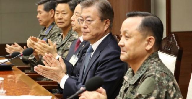 South Korean president Moon Jae-in (C) speaks to military commanders at the defense ministry in Seoul, South Korea(EPA-Yonhap)