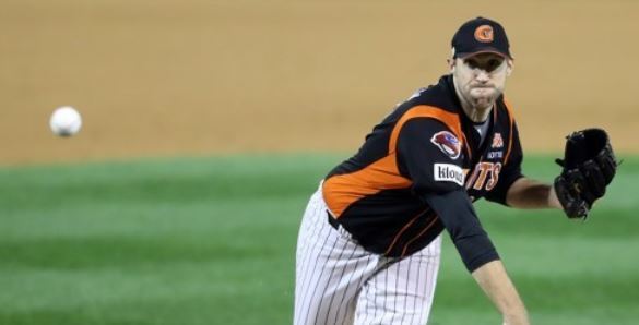 In this file photo taken Oct. 13, 2017, Josh Lindblom of the Lotte Giants throws a pitch against the NC Dinos in the bottom of the eighth inning in Game 4 of their Korea Baseball Organization postseason series at Masan Stadium in Changwon, South Gyeongsang Province. (Yonhap)