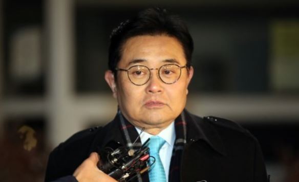 This file photo shows Jun Byung-hun, former senior secretary to President Moon Jae-in, appearing at the prosecution's office on Dec. 13, 2017. (Yonhap)