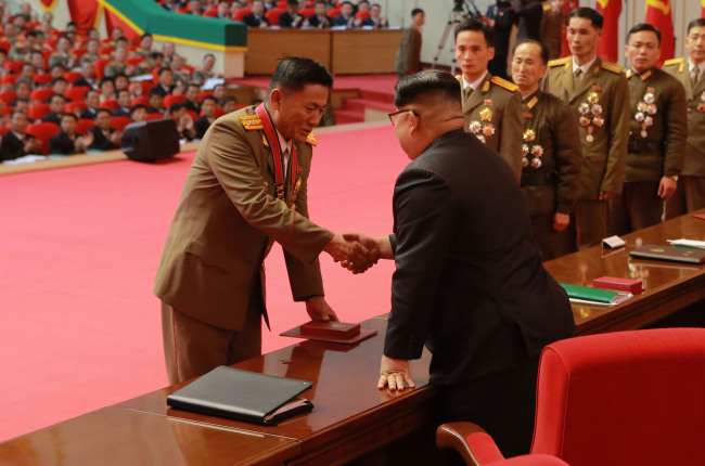 North Korean leader Kim Jong-un gives a speech in this undated photo released by the Korean Central News Agency (Yonhap)