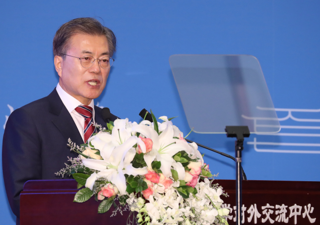 President Moon Jae-in gives a speech at Peking University in Beijing, Dec. 15. (Yonhap)