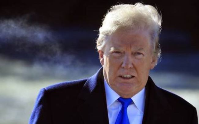 Donald Trump heads for the traditional presidential retreat at Camp David on Jan. 6, 2018. Trump said, "I always believe in talking (with North Korean leader Kim Jong-un)." (AP)