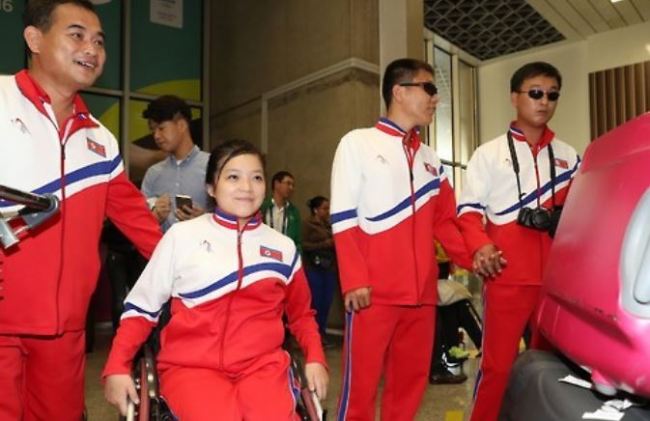In this file photo taken on Sept. 4, 2016, North Korean Paralympic athlete Song Kum-jong (2nd from L) arrives in Rio de Janeiro to compete at the 2016 Summer Paralympics. (Yonhap)
