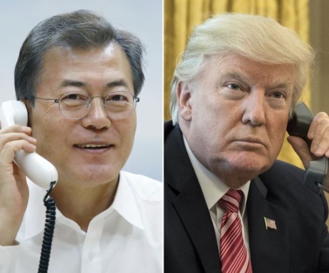 President Moon Jae-in and US President Donald Trump hold a telephone conversation on Wednesday. (Yonhap)