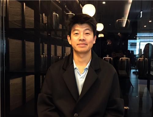 Chef Yim Jung-sik poses for a photo during an interview with Yonhap News Agency at his new restaurant at Incheon International Airport, west of Seoul, on Jan. 17, 2018. (Yonhap)