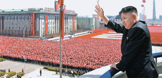 North Korea’s leader Kim Jong-un waved his hand to massive crowd gathered to celebrate his late grandfather Kim Il-sung’s 100th birthday in 2012. Yonhap