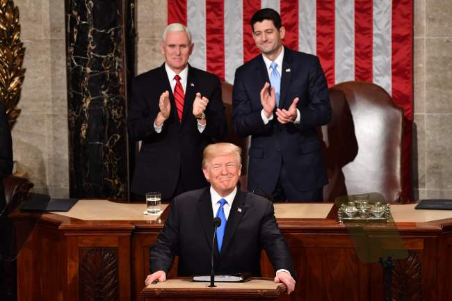 US President Donald Trump gives his State of the Union address on Wednesday, and Vice President Mike Pence and Speaker of the House of Representatives Paul Ryan clap in the background. Yonhap