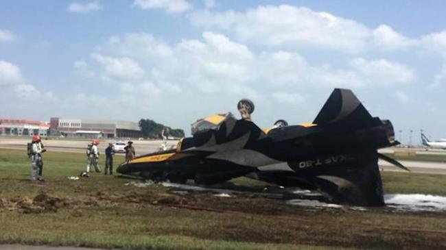 Photo shows the Black Eagles plane from flight display team of South Korean Air Force burned after catching fire at Changi Airport in Singapore, on Tuesday. (Yonhap)
