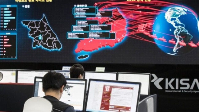 Employees watch electronic boards to monitor possible ransomware cyberattacks at the Korea Internet and Security Agency in Seoul, South Korea. (AP)