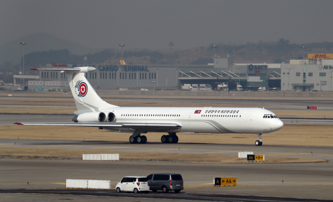 A North Korean special plane carrying its high-level delegation lands in Incheon Airport on Friday. (Yonhap)