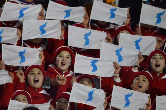 The Opening Ceremony for the 2018 Winter Olympics kicks off at the PyeongChang Olympic Plaza in PyeongChang, Gangwon Province, Friday. Pictured are North Korea's cheerleading squad at the event. (Lee Sang-sub/The Korea Herald)