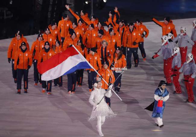 The Netherlands' athletes enter the PyeongChang Olympic Plaza during the Opening Ceremony of the 2018 Winter Games, Friday. (Yonhap)