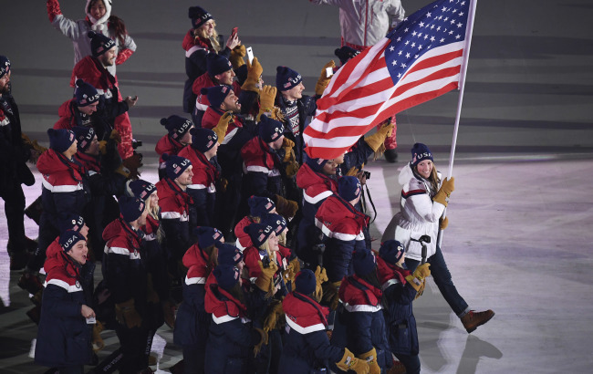 Psy`s Gangnam Style was played as the United States’ athletes marched in during the opening ceremony of the PyeongChang Olympic Games on Friday (Yonhap).