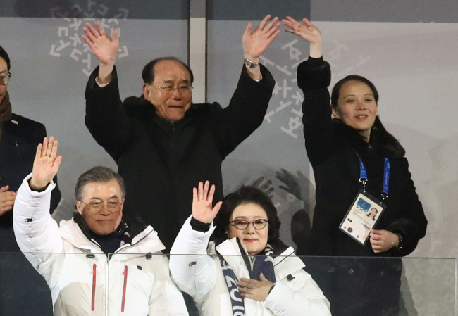 Kim Young-nam, (top row, left) the President of the Presidium of the Supreme People’s Assembly of North Korea, tears up while watching athletes from South Korea and North Korea march under the Korea Unification Flag during the 2018 Winter Olympics Opening Ceremony at PyeongChang, Gangwon Province, Friday. To the right of Kim Young-nam is Kim Yo-jong, the younger sister of North Korea’s leader Kim Jong-un. In the front row are South Korea’s President Moon Jae-in (left) and first lady Kim Jung-sook. (Yonhap)