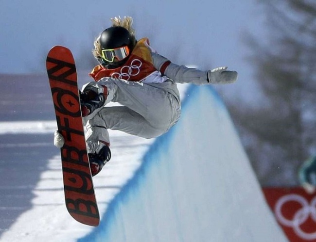 Chloe Kim, of the United States, jumps during the women’s halfpipe finals at Phoenix Snow Park at the 2018 Winter Olympics in Pyeongchang, South Korea, Tuesday, Feb. 13, 2018. (AP)