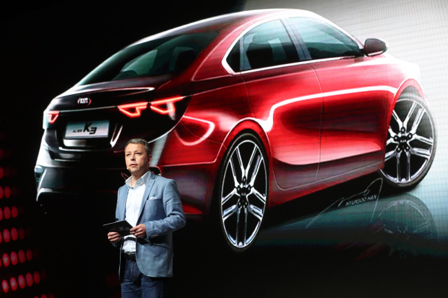 Kia Motors’ Pierre Leclercq, head of Styling, gives a presentation on the All New K3 at Walkerhill Hotel in Gwangjin-gu, Seoul, Tuesday. The K3, the first full-change model in six years, comes with a 1.6-liter gasoline engine along with “dynamic exterior” design and safety features such as front collision avoidance, blind-spot collision warning and driver attention warning systems.  (Yonhap)