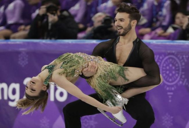 Gabriella Papadakis and Guillaume Cizeron of France perform during the ice dance, short dance figure skating in the Gangneung Ice Arena at the 2018 Winter Olympics in Gangneung, South Korea, Monday, Feb. 19, 2018. (AP)