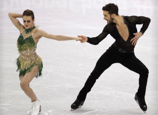 Gabriella Papadakis and Guillaume Cizeron of France perform during the ice dance, short dance figure skating in the Gangneung Ice Arena at the 2018 Winter Olympics in Gangneung, South Korea, Monday, Feb. 19, 2018. (AP)