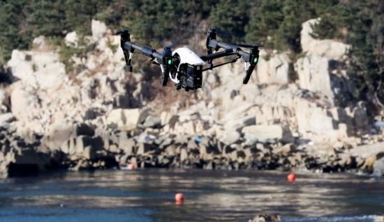 Army's drone conducts search and rescue operation at a beach near the port city of Busan. Yonhap